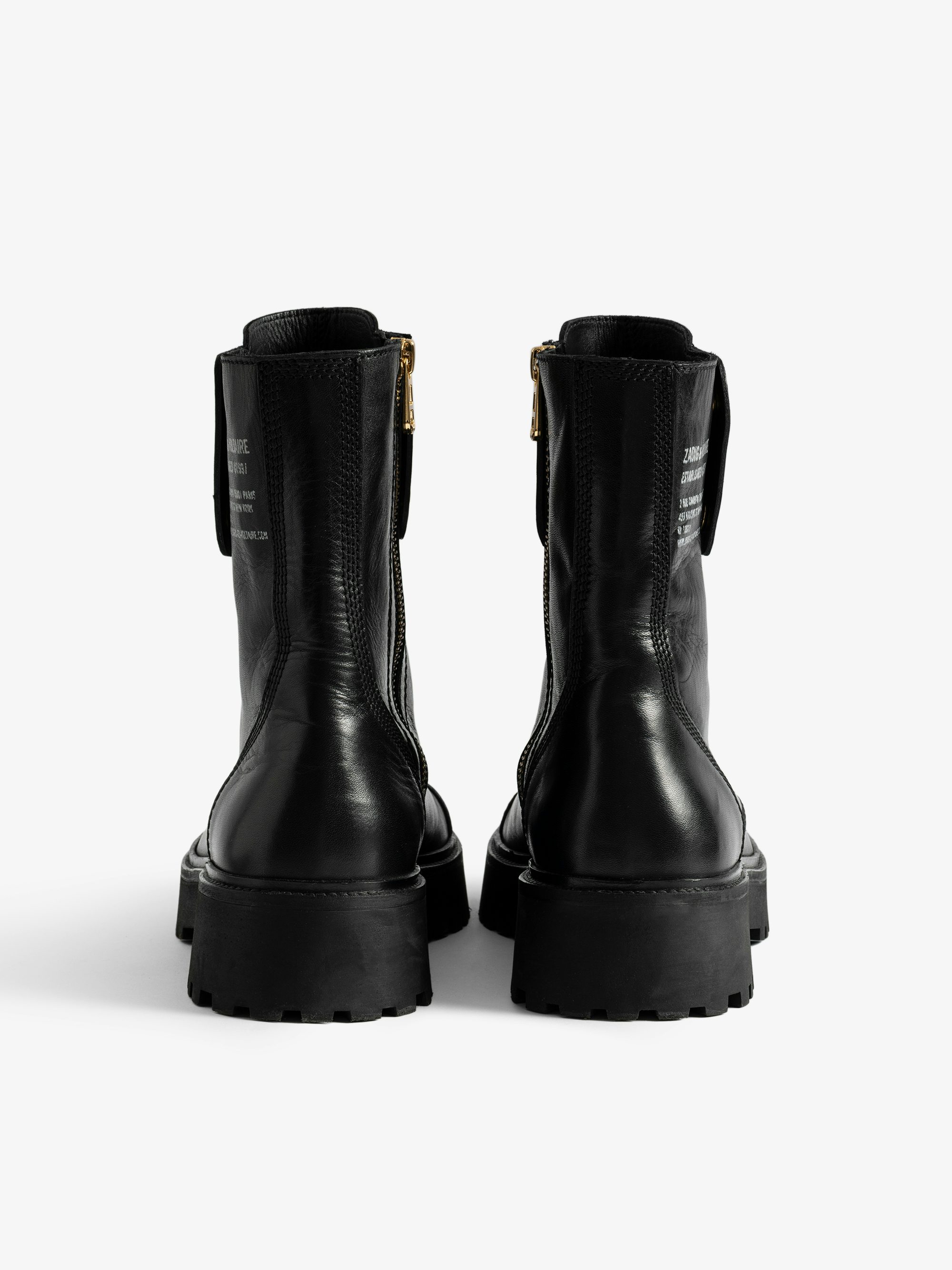 Joe Boots - Women's laceless combat boots with gold toned hardware.